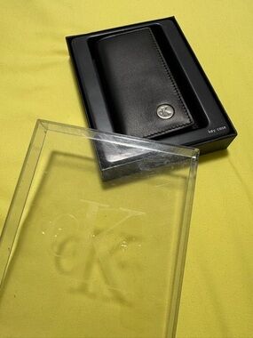 Unisex Calvin Klein Black Leather Key Wallet with Silver CK Emblem